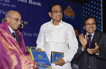 Petachi, grandson of the IOB founder with the Finance Minister P Chidambaram flanked by the CMD of IOB M Narendra