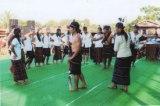 The youth performing cultural dance, with traditional attire.