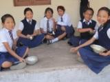 School Children partaking of a mid-day meal