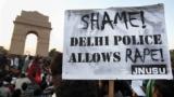 A placard displaying disappointment towards the police force of Delhi