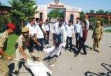 An effigy of the Prime Minister being burnt by AASU members at Dibrugarh