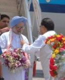 Dr. Manmohan Singh being received by Assam Chief Minister Tarun Gogoi