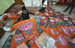 BJP workers arrange BJP flags in Agartala