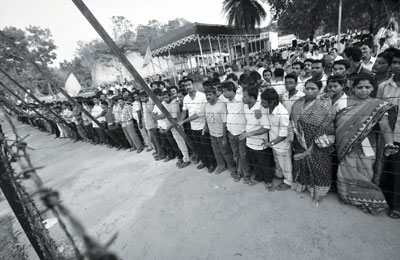 Pic:  Indian and Bangladesh official unveiling the foundation stone for the setting up of the second of the four proposed 'border haats' (bazaars) along the India-Bangladesh border at Kasba, 25 km west of Agartala,  May 21, 2014. 