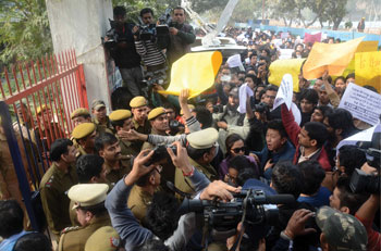 North East students try to force their way past security forces