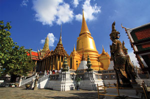 The sacred temple of the Grand Palace stood dazzling in the golden sunlight.