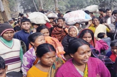 Hindus of Chehelgazi Union in Dinajpur attempt to leave the area following attacks on their homes, business and property.