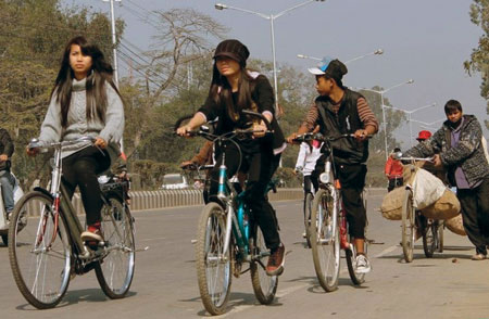 Youngsters on bikes in Imphal, Manipur